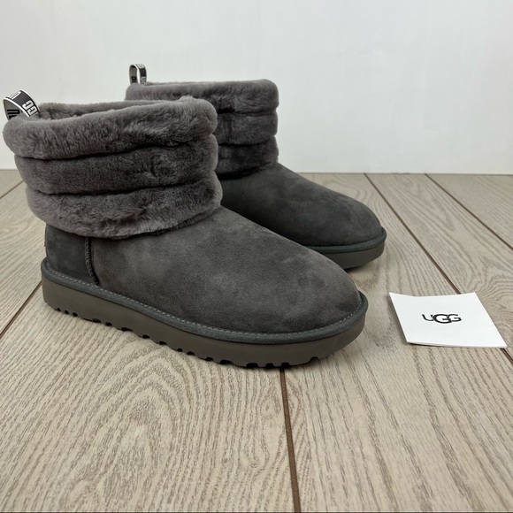 UGG Shoes - UGG Women's Fluff Mini Quilted Boots US10/EUR41 Black w/ White Logo Heel $160